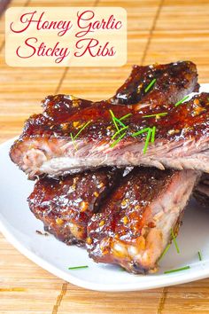 honey garlic sticky ribs on a white plate