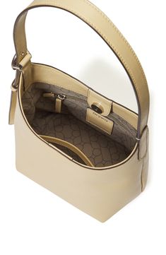 A sculptural buckle engraved with the brand's logo brings hardware shine to a timeless shoulder bag crafted from smooth, supple leather. Magnetic-snap closure Shoulder strap Interior zip wall pocket; slip pocket Geometric-print twill lining Leather Imported Butter, Wall Pockets, Geometric Print, Logo Branding, Snap Closure, Leather Shoulder Bag, Butter Cream, Shoulder Strap, Egg