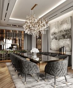 an elegant dining room with chandelier and chairs