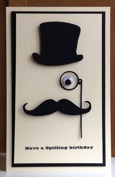 a card with a mustache and eyeball on it