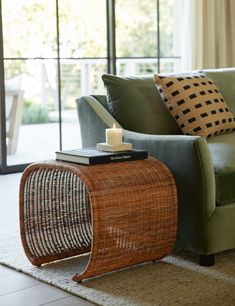 a living room with a couch, chair and coffee table