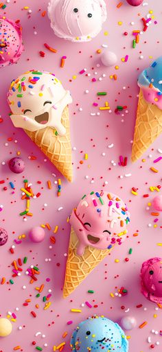 ice cream cones with sprinkles and candies on a pink background,