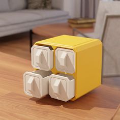 a yellow object sitting on top of a wooden table