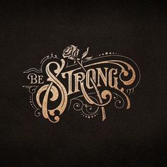 the words be strong are written in gold on a black background with swirls and scrolls