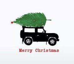 a truck with a christmas tree on the back of it's flatbed is shown