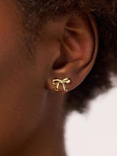 Trending and sweet, these bow earrings plated in 14k gold feature a bow silhouette and tarnish-proof finish designed to effortlessly tie your look together. Bow Silhouette, Bow Earrings, Letter Necklace, Online Jewelry Store, Anniversary Sale, Gold Design, Designer Earrings, Perfect Outfit, Jewelry Stores