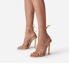 Gold Heels With Lace Up Detailing Gold High Heel Spring Heels, Gold Lace-up Sandals For Evening, Spring Gold Heels With Reinforced Heel, Gold Strappy Heels For Spring, Gold Lace-up Heels For Formal Occasions, Gold Prom Shoes, Gold Lace Up Heels, Holiday Heels, Gold Block Heels