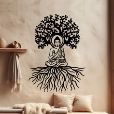 a buddha statue sitting under a tree with roots on the wall in front of it