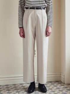 This product exemplifies modern sophistication with a minimalist design that complements a variety of styles. The Light Semi-Wide Cotton Pants are tailored to offer a comfortable, semi-wide fit that flatters the form while allowing for ample movement. With their crisp lines and structured fabric, these pants present a polished aesthetic suitable for both formal and casual settings. - Crafted from premium cotton, these pants offer breathability and comfort for all-day wear.- The semi-wide cut of these trousers ensures a contemporary look with a hint of relaxed elegance.- Equipped with a clean waistline and discreet pockets, the design maintains a sleek and uncluttered profile.- A concealed closure system adds to the seamless look, enhancing the garment's modern charm. Celana Aesthetic, Polished Aesthetic, Relaxed Elegance, Structured Fabric, Formal Pants, Cotton Pants, Minimalist Fashion, Minimalist Design, Sleek