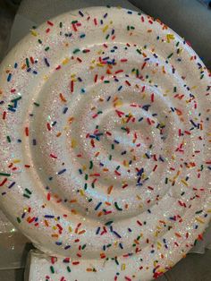 a white plate topped with lots of sprinkles