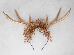 This beautiful antler headband is a lovely accessory, perfect for a party or photo-shooting session. Our stunning faux flowers look like the real. Head circumference:  one size fits all (adjustable) / fits adults Antler Headdress, Deer Antler Headband, Faun Costume, Deer Antlers Headband, Gold Deer, Antler Headband, Floral Headband, Deer Antler, Gold Crown