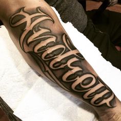 a person with a tattoo on their arm