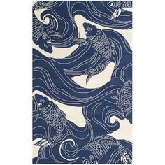 a blue and white rug with two fish on the water in front of an ocean wave