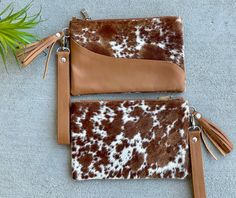 "Genuine Hair on CowhideCowhide Purse Wristlet Clutch Phone Wallet Handbag Brown Calf Leather This listing is for a beautiful wristlet designed in genuine hair on cow hide. The purse features cowhide on both sides. It features a secure zip closure and detachable strap made in real leather. The inside is cloth lined. The wristlet can either be carrier on its own or can be carried tossed inside larger bags. Measures 8.5\" wide and 5.5\" deep. Available in Brown/Tan, Black and Dark Brown colors. Yo Handmade Leather Purse, Bags 2024, Western Purses, Purse Scarf, Tote Bag Patters, Ladies Clutch, Wristlet Clutch, Cow Hide, Cute Bags