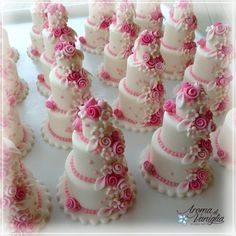 wedding cakes decorated with pink and white frosting