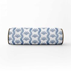 a roll of blue and white patterned paper