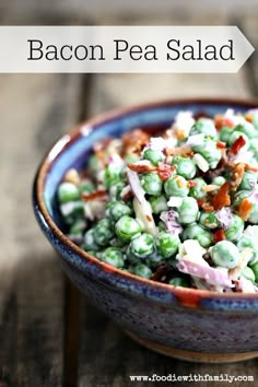 a close up of a bowl of food with peas and bacon in it on a table