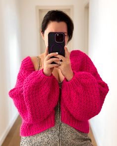 Add a touch of whimsy and warmth to your wardrobe with this delightful hand-knitted pink crop cardigan. Expertly crafted with love and attention to detail, this unique piece features a beautiful textured pattern that sets it apart from the rest. Features: Hand-Knitted: Each cardigan is meticulously hand-knitted, ensuring high quality and a personal touch. Beautiful Texture: The intricate textured pattern adds depth and visual interest. Perfect Crop Length: Ideal for layering over dresses, high-waisted jeans, or skirts for a trendy look. Soft and Cozy: Made from soft, high-quality yarn, this cardigan is as comfortable as it is stylish. Versatile Style: The lovely pink hue complements a variety of outfits, making it a versatile addition to your wardrobe. Whether you're dressing up for a spec Pink Oversized Cropped Sweater For Winter, Oversized Pink Cropped Sweater For Winter, Pink Trendy Cropped Knit Sweater, Trendy Pink Cropped Knit Sweater, Winter Cropped Pink Sweater, Pink Balloon Sleeve Sweater For Winter, Pink Cropped Sweater For Winter, Cozy Pink Cropped Sweater For Winter, Cozy Pink Cropped Sweater For Fall