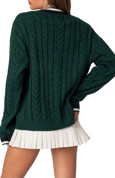 Classic cables and striped trim prep up this sweater knit from supersoft yarns in an oversized fit that layers over your tennis togs or anything else. V-neck Long sleeves with ribbed cuffs 100% Acrilan acrylic Hand wash, dry flat Imported Oversized Cable Knit Sweater, Emerald Green Sweater, Wardrobe Wishlist, Cable Sweater, Green Sweater, Cable Knit Sweater, Sweater Knit, Ribbed Sweater, Everyday Outfits