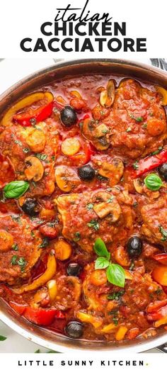 a pan filled with chicken cacciatore and olives on top of a table