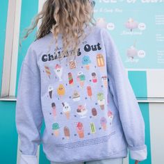 Women's printed sweatshirt with “Chilling Out” slogan and illustrated ice cream guide. Which will you choose? Chill out this summer in this ice cream dream graphic sweater. Super-comfy oversized fit. Makes a great gift and a sweet self purchase for summer staycation. All Batch1 products are lovingly designed, printed and packed by hand in the UK at Batch1 HQ.  Our garments are made to order to minimise wastage and printed using water-based, eco-friendly inks. We are committed to creating on-tren Summer Staycation, Women Slogan, Slogan Sweatshirt, Graphic Sweaters, Printed Sweatshirts, This Summer, Sustainable Fashion, The Uk, Sweatshirts Women