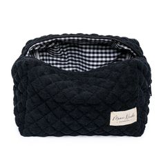 Our Space Large Makeup Bag is a stylish and spacious carry-all designed to hold all your essentials with a classic look.  The quilted black towel exterior is soft and luxurious, complemented by the elegant black & white gingham interior.  Ideal for organizing your makeup and beauty essentials or serving as a travel organizer (it fits perfectly inside a suitcase), this bag is a must-have for anyone who values both organization and style.  Size: 10" x 6" x 6" Gingham Interior, Terry Makeup, Black Makeup Bag, Cute Makeup Bags, Large Makeup Bag, Black Cosmetics, Black Gingham, Black Towels, Makeup Bag Organization