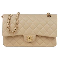 Chanel Beige Lambskin Leather 10" Medium Double Flap Classic Bag with Goldtone Hardware Made In: France Color: Light beige, gold Hardware: Goldtone Materials: Lambskin leather, metal Lining: Beige leather Closure/Opening: Flap top with CC twistlock and snap flap under Exterior Pockets: Half moon patch pocket Interior Pockets: Zipper pocket on top flap, back section under top flap, two wall pockets in middle section, front section Exterior Condition: Excellent Interior Condition: Excellent Includ Beige Chanel Classic Flap Outfit, Chanel Flap Bag Beige, Chanel Bag Classic Flap, Chanel Double Flap Bag, Chanel Bag Classic, Chanel Double Flap, Chanel Classic Flap Bag, Chanel Beige, Chanel Top