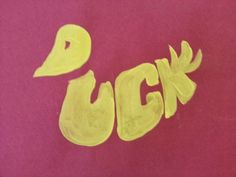 the word luck written in yellow ink on a pink background with an image of a duck