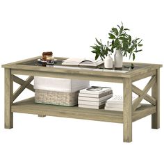 a coffee table with books and plants on top