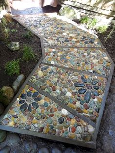 a walkway made out of rocks and stones