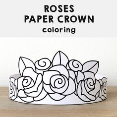 a paper crown with roses drawn on it