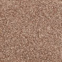 a brown and white background with small speckles on the surface, like glitter