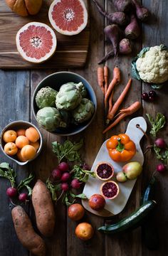 various fruits and vegetables laid out on a table