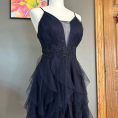 Beautiful Navy Blue Party/Formal Dress. Pear Culture, Soft Sparkle, Corset Back, Adjustable Straps, Beautiful Beading. Bnwt! $109 New. Never Worn. This Dress Is Stunning! Size Juniors 7/8 Brand Pear Culture Navy Blue Party, Party Formal Dress, Corset Back, Blue Party, Formal Dress, Pear, Beading, Navy Blue, Sparkle