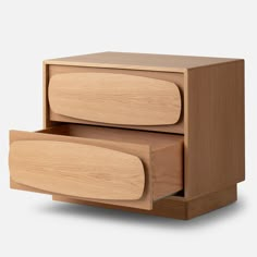 two wooden drawers with one drawer open and the other closed, both stacked on top of each other