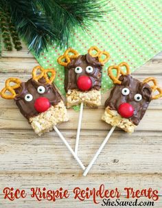 reindeer rice krispy kreme treats on sticks with pretzels in the middle