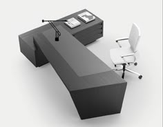 an office desk with two chairs next to it