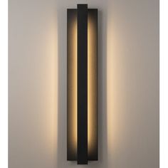 a wall mounted light with two lights on it's side and one is lit up