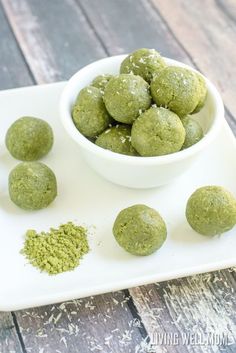 green powdered balls in a white bowl on a plate