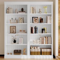 a white bookcase filled with lots of books