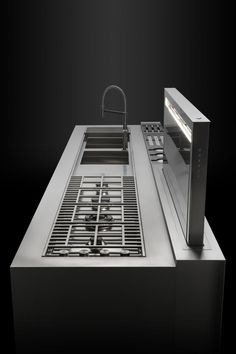 a stainless steel kitchen sink and counter top