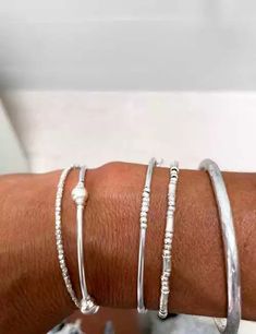 silver memory bracelet stack Sterling Silver Jewelry Aesthetic, Cool Silver Bracelets, Silver Bracket Stack, White Silver Jewelry, Unique Silver Bracelets, Silver Jewelry Aesthetic, Silver Jewelry Bracelets, Memory Bracelet, Silver Boho Jewelry