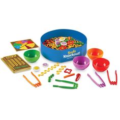 the learning toy is set up to play with its ingredients and tools, including pasta