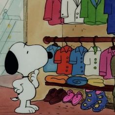 a cartoon dog standing in front of a clothing rack