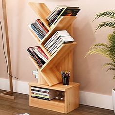 a bookshelf that is made out of wood and has many books on it