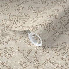 a close up view of a wallpaper with an intricate design on the fabric,