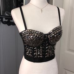 Never Worn Bustier With Removable Straps, All Stones Intact As I Did Reinforced Them When It First Arrived Just Never Had The Guts To Wear It Its A L But I’d Say It’s More Of Smaller Large Could Fit A Medium Im 34c Cup Size. It Can Accommodate A D For Sure Black Party Corset With Built-in Bra, Edgy Strapless Corset For Party, Punk Style Party Corset With Straps, Edgy Strapless Party Corset, Edgy Party Corset With Straps, Edgy Corset For Summer Parties, Glamorous Black Summer Corset, Edgy Party Corset For Summer, Edgy Summer Party Corset