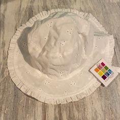 Cute White With Eyelet Design Throughout. Brand New With Tags Says One Size And Will Probably Fit Up To 18-24 Months. It Is Soft And Cool Great To Keep The Sun Off Baby’s Head. Baby Sun Hat, Soft Baby, Baby Soft, Sun Hat, Sun Hats, Kids Accessories, Accessories Hats, The Sun, Kids Shop