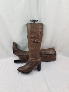 Brown gogo style round toe knee high boots made of genuine leather. These beautiful wide heel boots look great with a jacket or coat. The soft leather makes these shoes very comfortable. Renaissance style boots are always spectacular shoes. In a single copy. These boots are a vintage accessory. Rare vintage high heel boots. Limited edition, in good condition. I can send additional photos upon request. Materials: leather The circumference calf width - 14 Inches Boots height - 18,5 Inches Heel hei Vintage Knee High Boots, Vintage Leather Platform Boots For Winter, Vintage Knee-high Heeled Boots For Winter, Brown Mid-calf Leather Boots, Vintage Wide Calf Leather Mid-calf Boots, Brown Wide Calf Knee-high Boots, Vintage Knee-high Heeled Boots, Brown Vintage Wide Calf Boots, Brown Wide Calf Mid-calf Heeled Boots