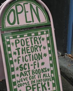 a green and white sign that says poetry theory fiction sci - fi art books we've got all gone in and have a peek